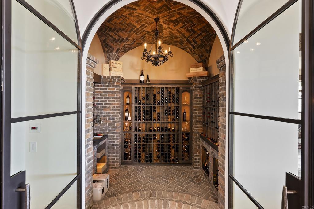 5293 La Glorieta Rancho Santa Fe, CA 92067 - Photo 14 of 25 a view of a hallway with wooden floor and entryway