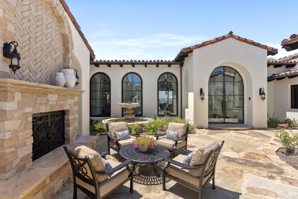 5293 La Glorieta Rancho Santa Fe, CA 92067 - Photo 18 of 25 a view of hall way with furniture and fireplace