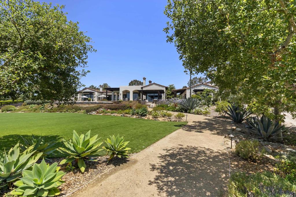 5293 La Glorieta Rancho Santa Fe, CA 92067 - Photo 21 of 25 a view of a garden with plants and trees