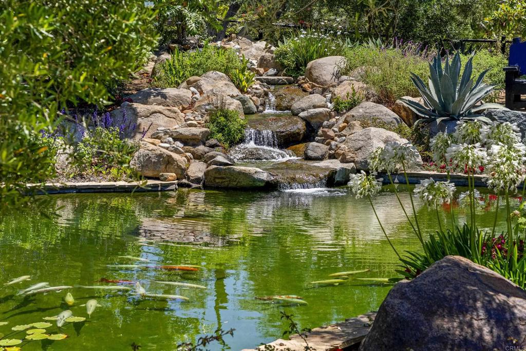5293 La Glorieta Rancho Santa Fe, CA 92067 - Photo 25 of 25 a view of a lake with a building in the background