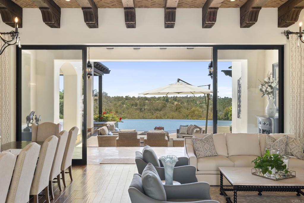 5293 La Glorieta Rancho Santa Fe, CA 92067 - Photo 4 of 25 a living room with furniture and a floor to ceiling window