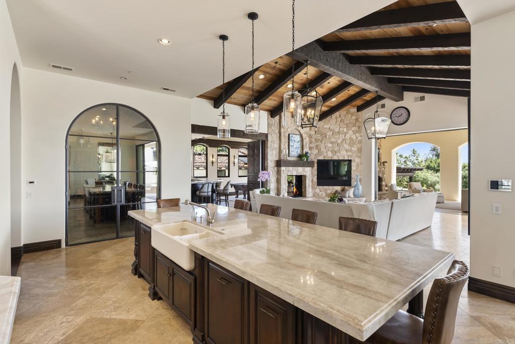 5293 La Glorieta Rancho Santa Fe, CA 92067 - Photo 6 of 25 a dining room with wooden floor and furniture