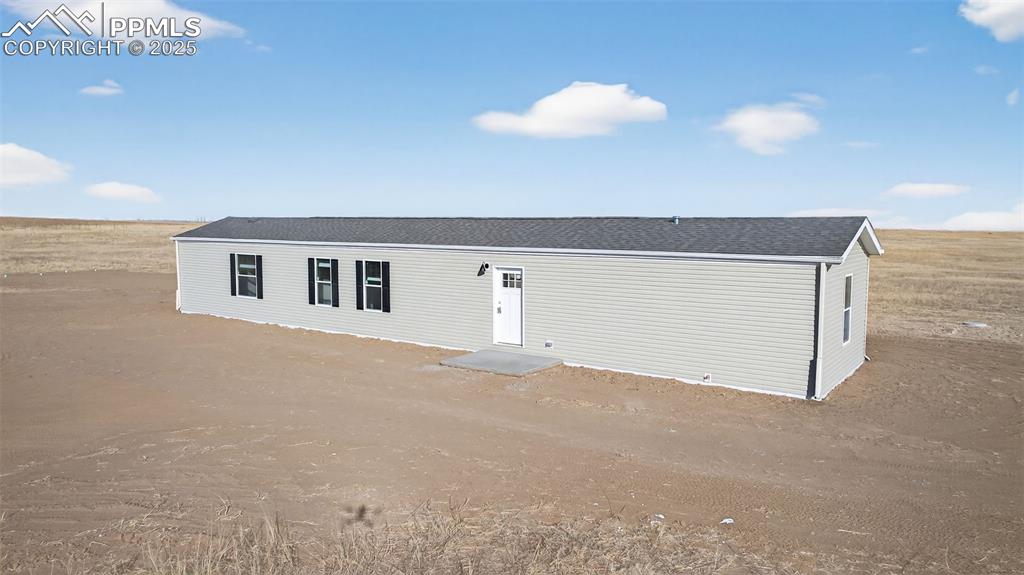 6815 Ramah Highway Yoder, CO 80864 - Photo 1 of 39 a view of empty room with window