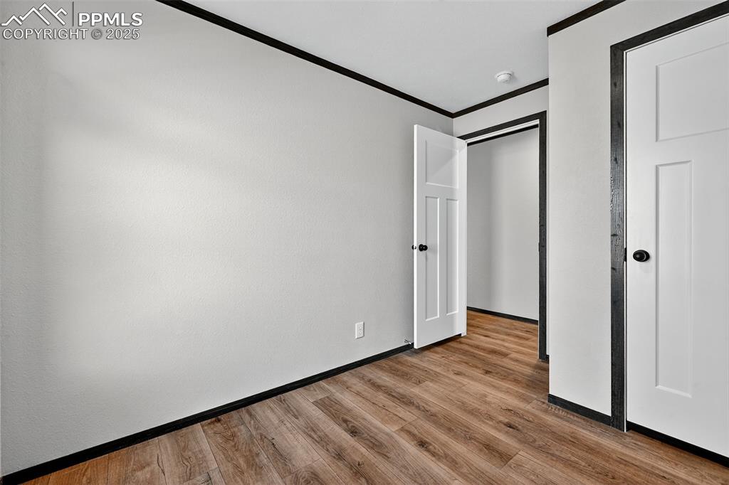 6815 Ramah Highway Yoder, CO 80864 - Photo 21 of 39 a view of hallway with wooden floor
