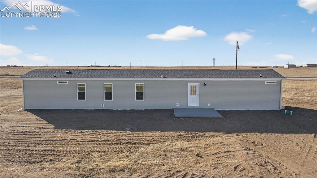 6815 Ramah Highway Yoder, CO 80864 - Photo 7 of 39 a view of a livingroom with a fireplace