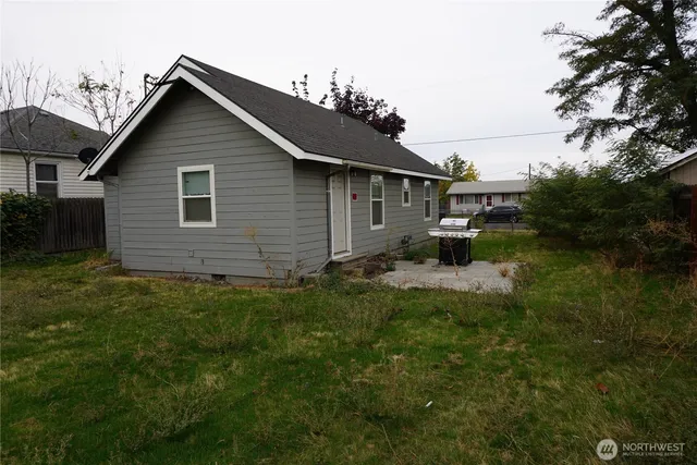 a backyard of a house with lots of green space