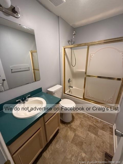 113 Kristin Avenue Spring Lake, NC 28390 - Photo 9 of 11 a bathroom with a granite countertop sink mirror vanity and toilet