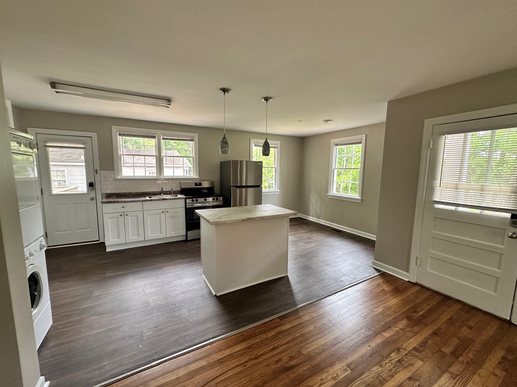 3136 Norris Road Columbus, GA 31907 - Photo 14 of 17 a living room with granite countertop wooden floors and kitchen view