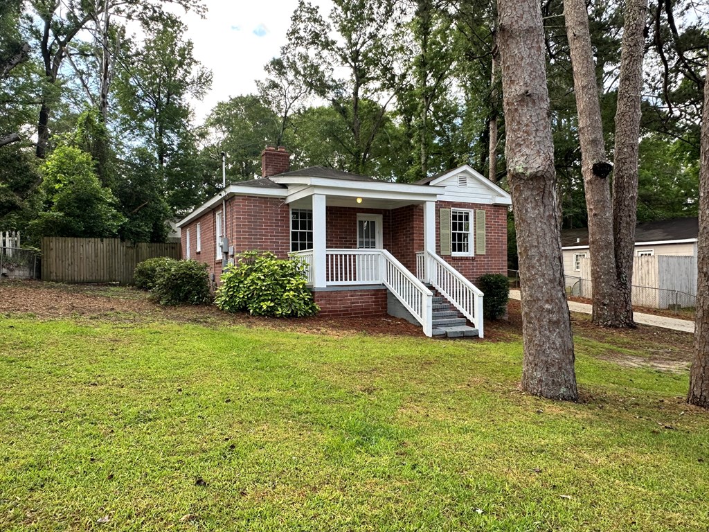 3136 Norris Road Columbus, GA 31907 - Photo 2 of 17 a view of a house with backyard and garden