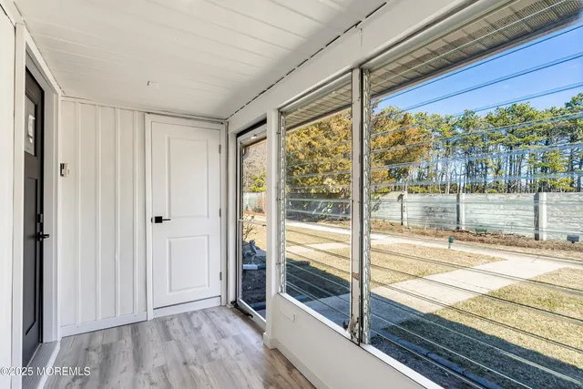 a view of a room with a window