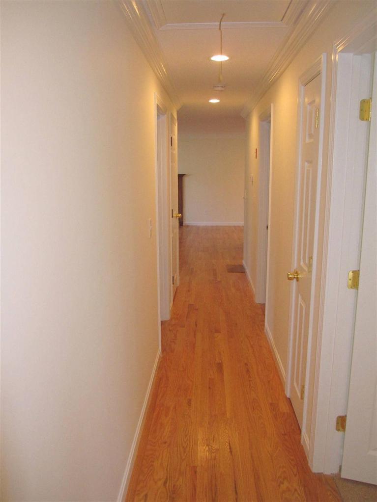 75 Beldan Lane Centerville, MA 02632 - Photo 14 of 24 a view of a hallway with wooden floor