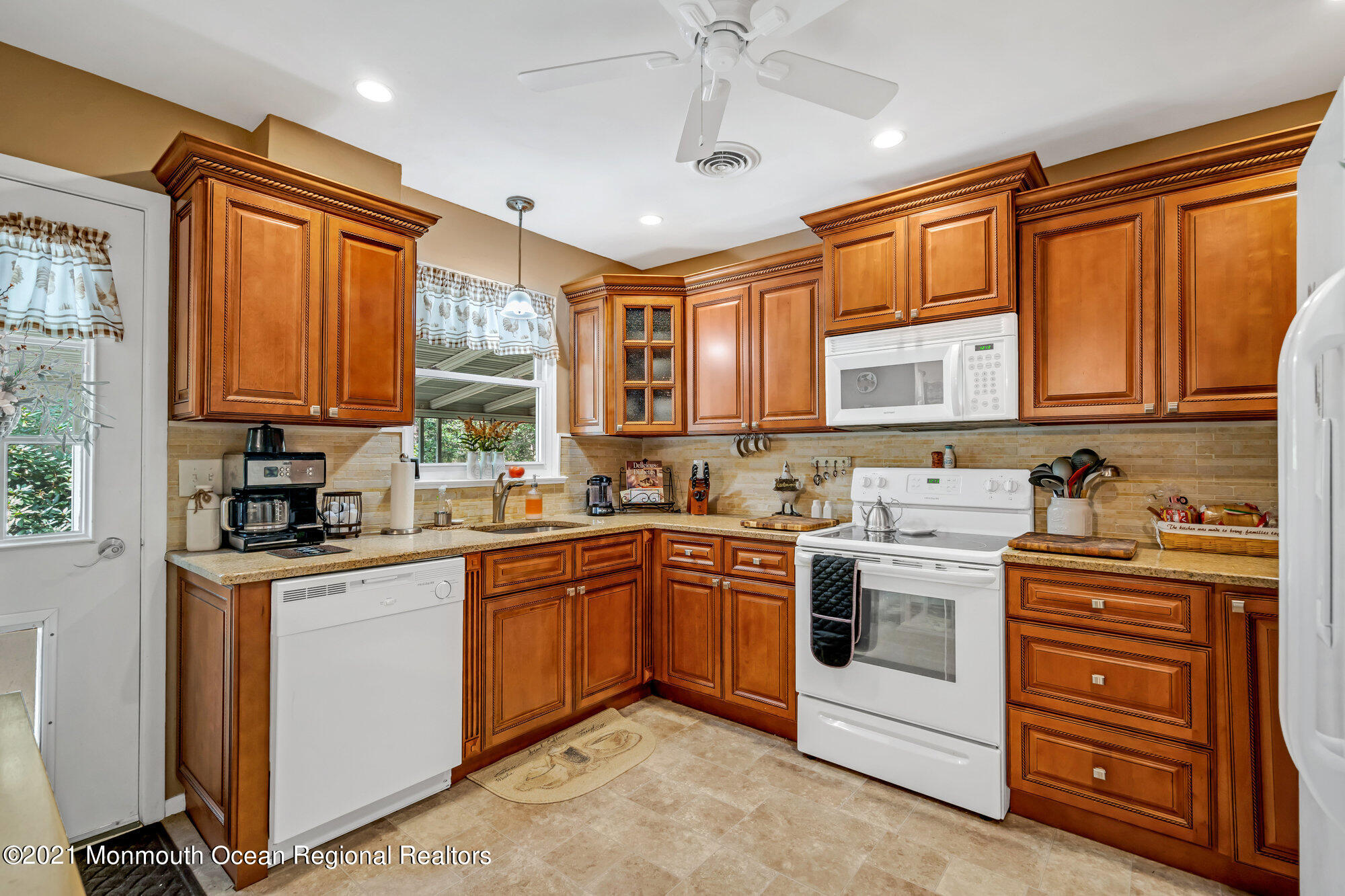29 A Sunset Road, Unit A Whiting, NJ 08759 - Photo 19 of 40 a kitchen with stainless steel appliances granite countertop a stove sink and cabinets