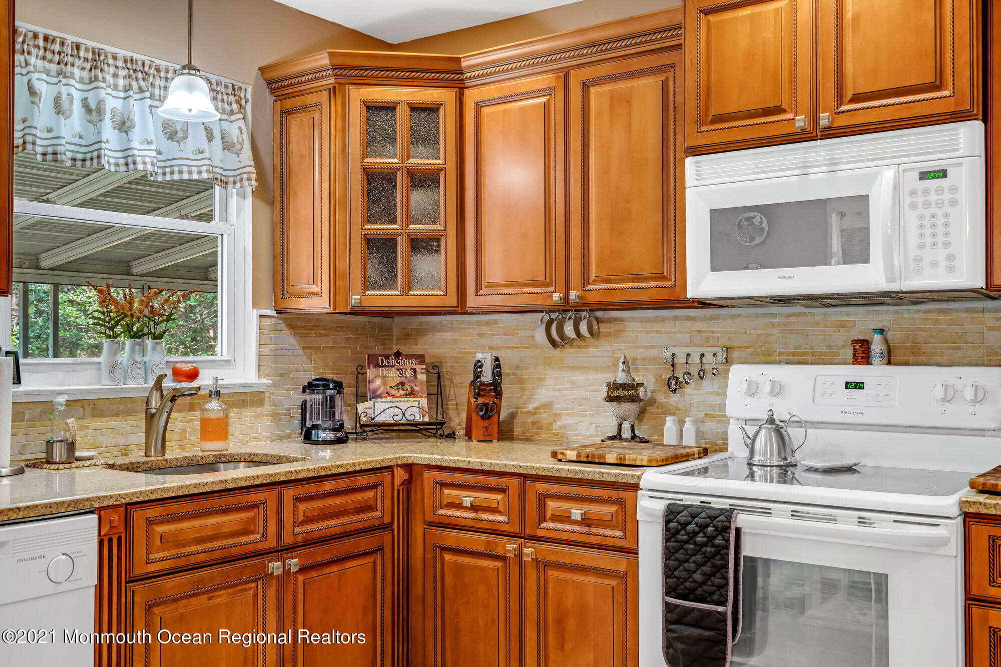 29 A Sunset Road, Unit A Whiting, NJ 08759 - Photo 20 of 40 a kitchen with stainless steel appliances granite countertop a sink and cabinets with wooden floor