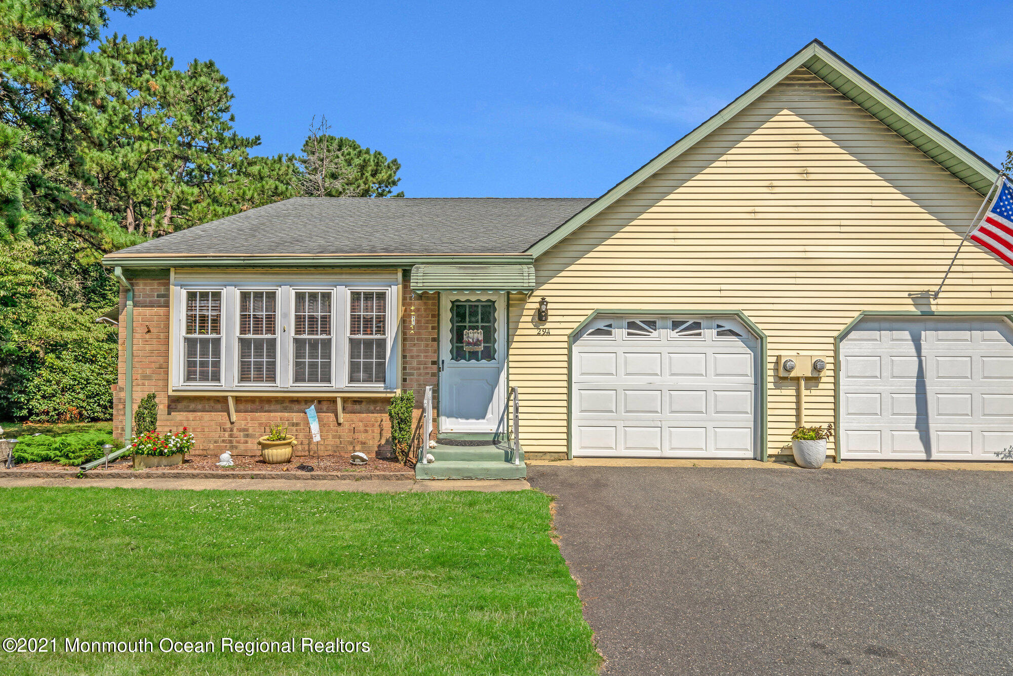 29 A Sunset Road, Unit A Whiting, NJ 08759 - Photo 3 of 40 a front view of a house with a yard