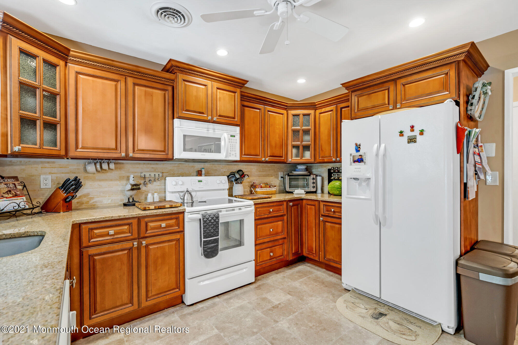 29 A Sunset Road, Unit A Whiting, NJ 08759 - Photo 21 of 40 a kitchen with stainless steel appliances granite countertop a refrigerator and a stove top oven