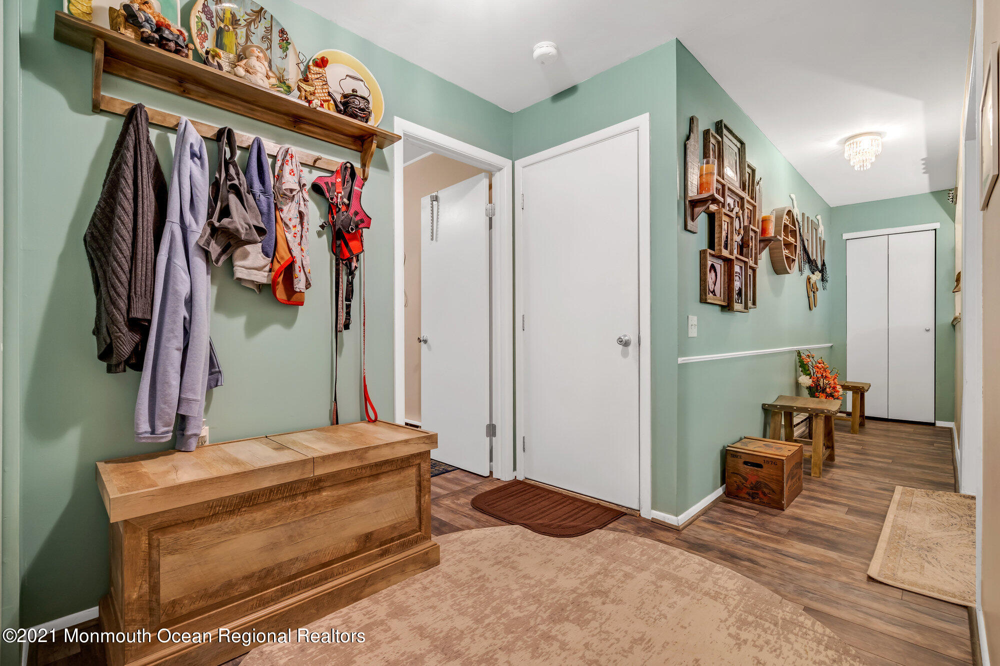 29 A Sunset Road, Unit A Whiting, NJ 08759 - Photo 27 of 40 a bedroom with a large bed and a large mirror on the dresser
