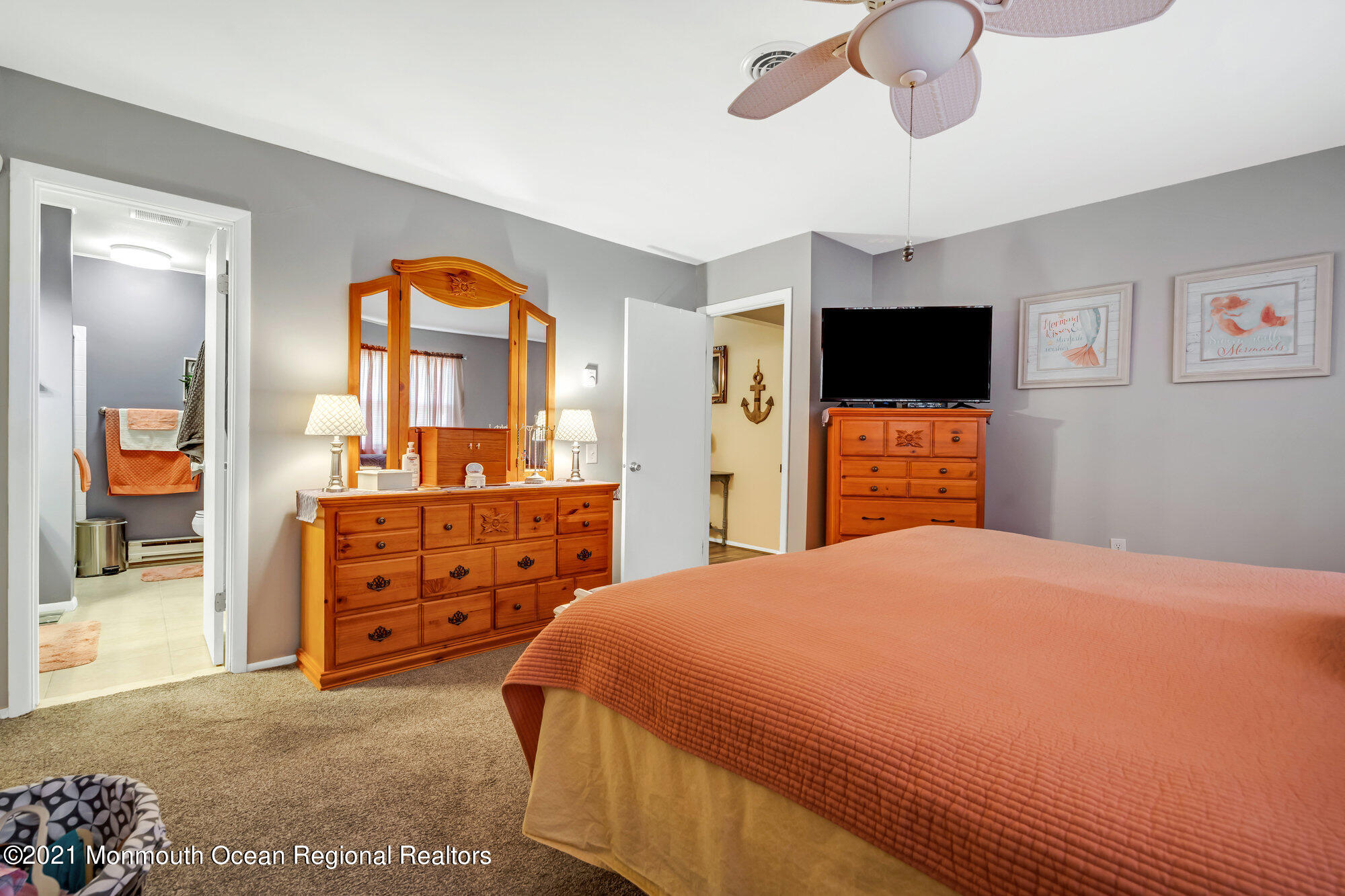 29 A Sunset Road, Unit A Whiting, NJ 08759 - Photo 33 of 40 a bedroom with a bed and a flat tv screen on dresser