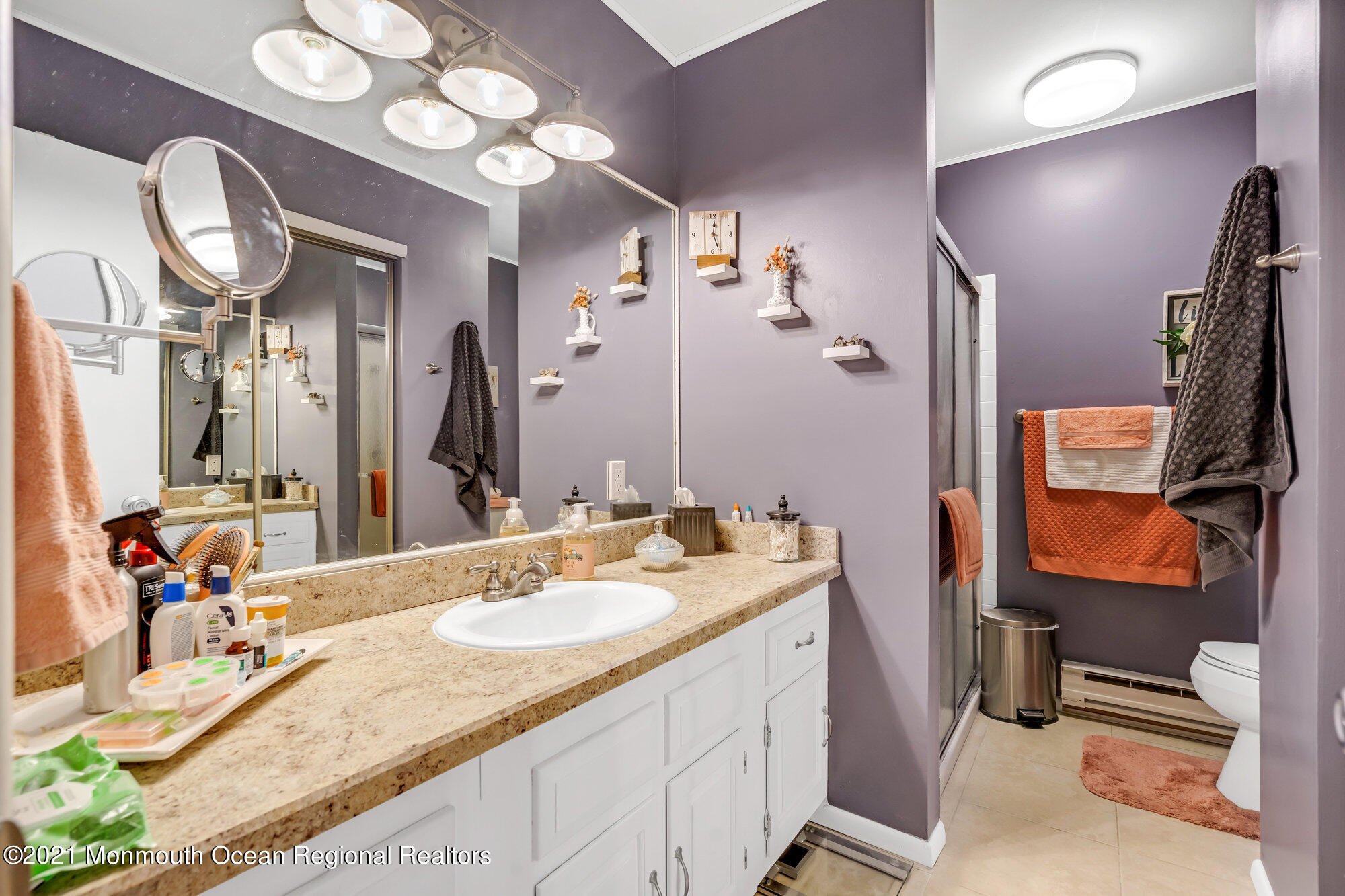 29 A Sunset Road, Unit A Whiting, NJ 08759 - Photo 34 of 40 a bathroom with a sink double vanity granite and a mirror