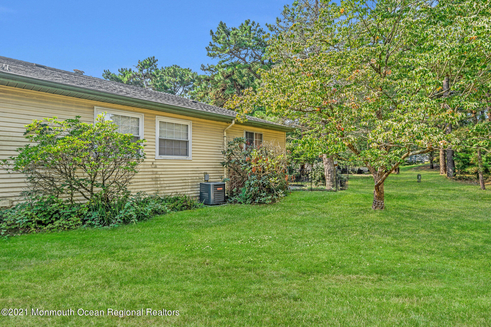 29 A Sunset Road, Unit A Whiting, NJ 08759 - Photo 39 of 40 a view of a house with a yard