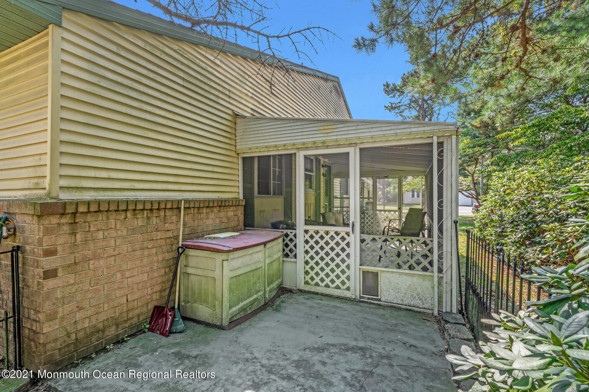 29 A Sunset Road, Unit A Whiting, NJ 08759 - Photo 40 of 40 a view of a room with a large window and flower garden