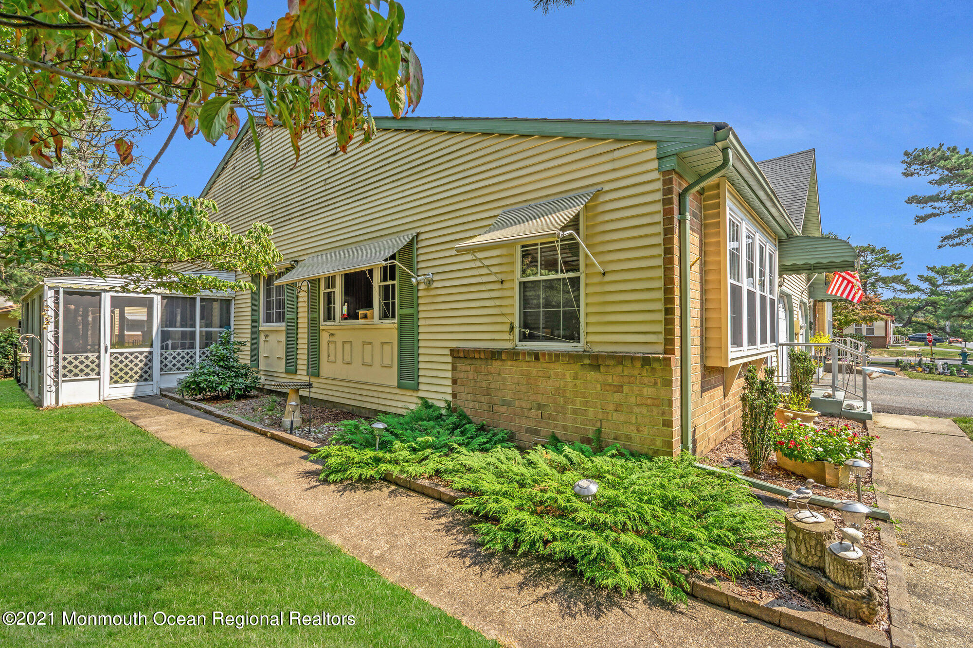 29 A Sunset Road, Unit A Whiting, NJ 08759 - Photo 9 of 40 a front view of a house with garden