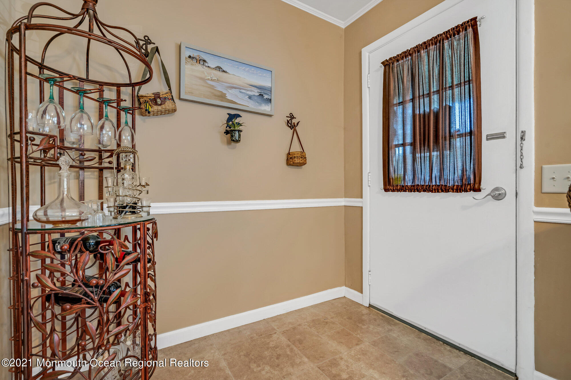 29 A Sunset Road, Unit A Whiting, NJ 08759 - Photo 10 of 40 a view of a balcony with wooden floor and cabinet