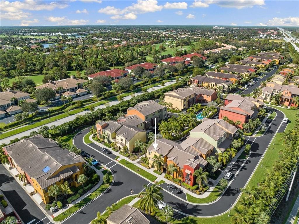 8997 Cambria Circle, Unit 201 Naples, FL 34113 - Photo 31 of 33 an aerial view of multiple house