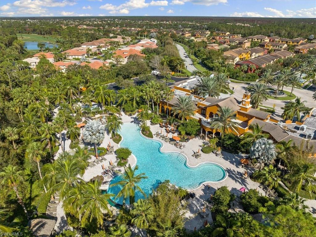 8997 Cambria Circle, Unit 201 Naples, FL 34113 - Photo 33 of 33 an aerial view of residential houses with outdoor space