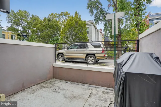 a car parked in front of a house