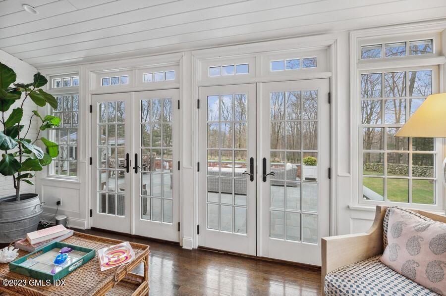 9 Cameron Drive Greenwich, CT 06831 - Photo 12 of 43 a living room with furniture and a window