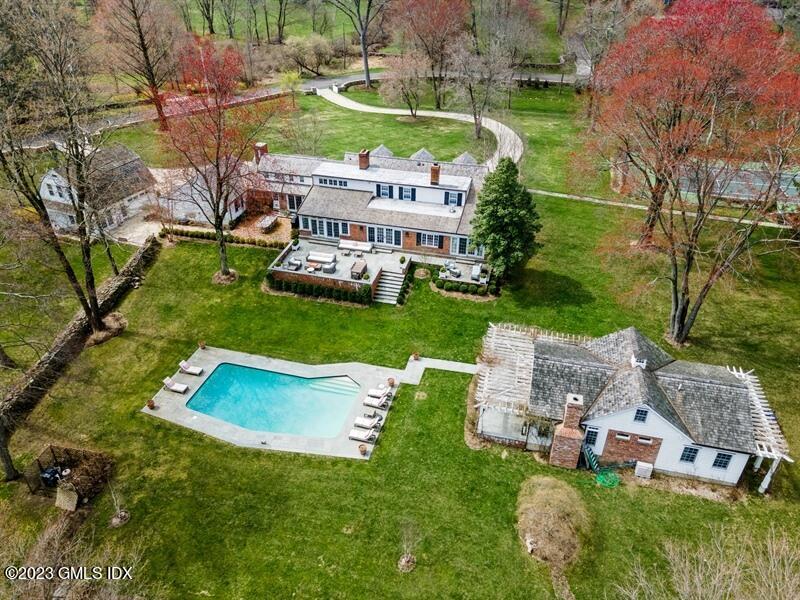 9 Cameron Drive Greenwich, CT 06831 - Photo 2 of 43 an aerial view of a house with garden space and street view