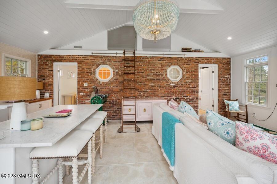 9 Cameron Drive Greenwich, CT 06831 - Photo 28 of 43 a spacious bathroom with a granite countertop double vanity sink a mirror and a bathtub