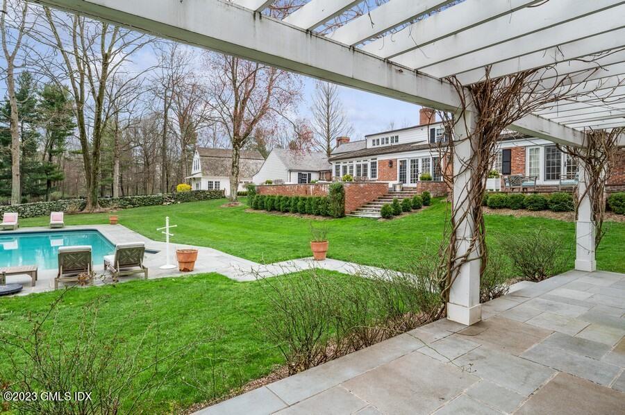 9 Cameron Drive Greenwich, CT 06831 - Photo 34 of 43 a front view of house with yard