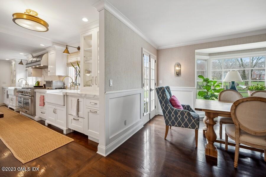 9 Cameron Drive Greenwich, CT 06831 - Photo 7 of 43 a view of a dining room with furniture and wooden floor