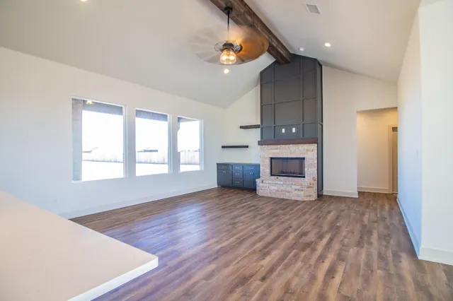 a view of cabinets with wooden floor