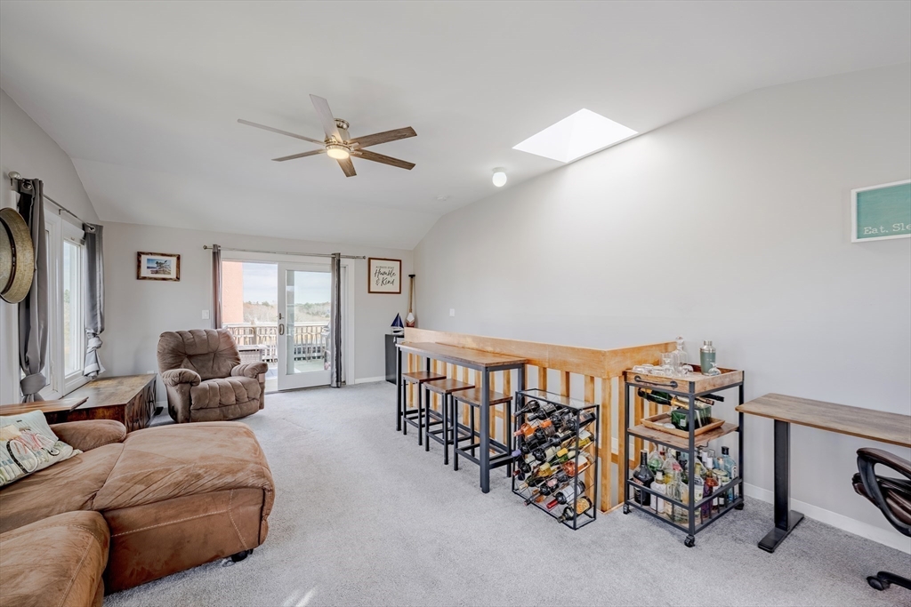 45 Main Street, Unit 38 Wareham, MA 02571 - Photo 23 of 30 a bedroom with furniture and a window