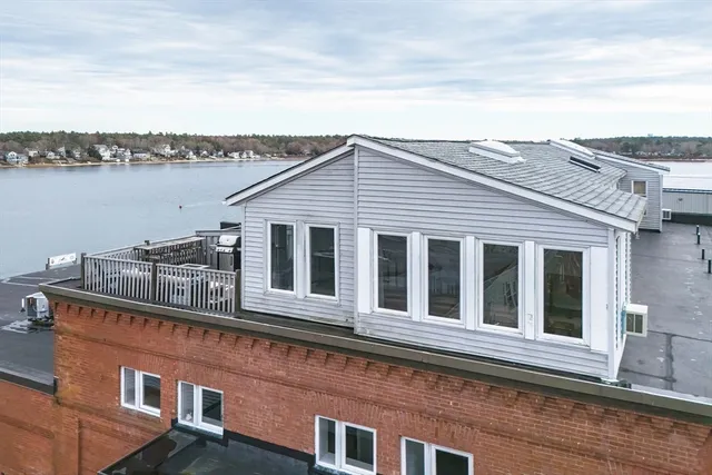 a view of a house with a ocean view