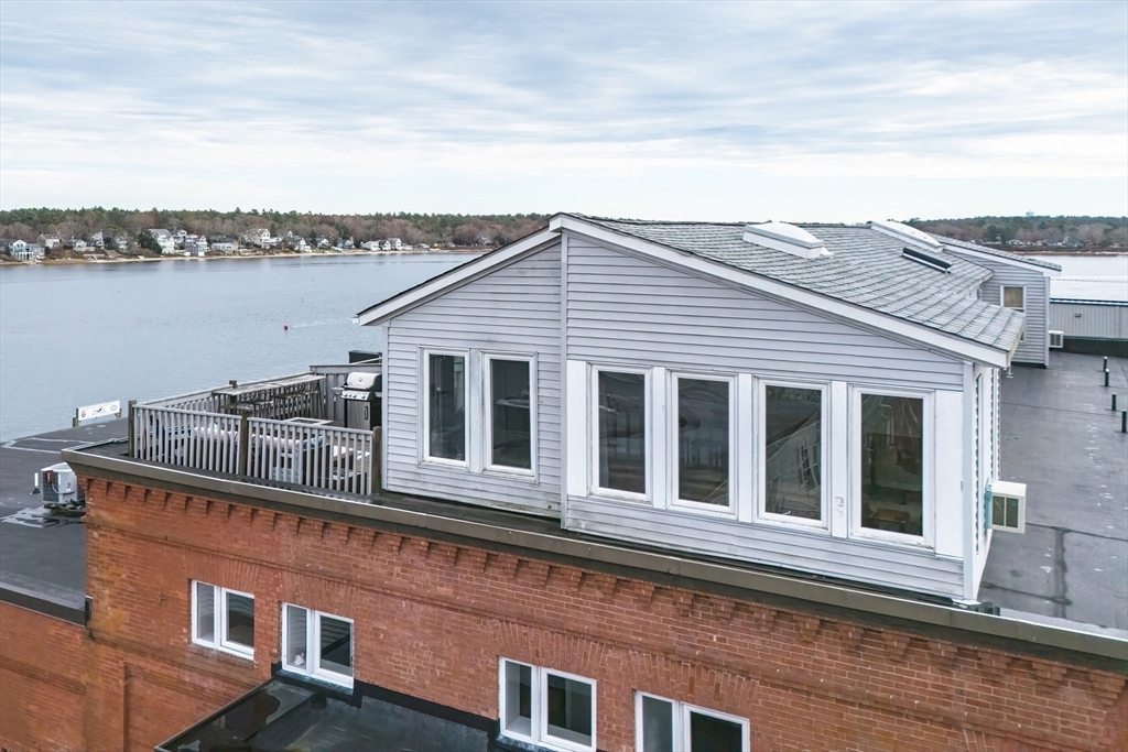 45 Main Street, Unit 38 Wareham, MA 02571 - Photo 6 of 30 a view of a house with a ocean view