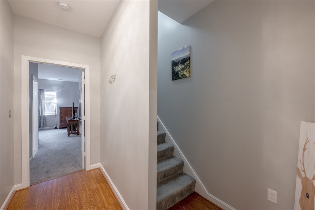 45 Main Street, Unit 38 Wareham, MA 02571 - Photo 7 of 30 a view of a hallway with wooden floor and entryway