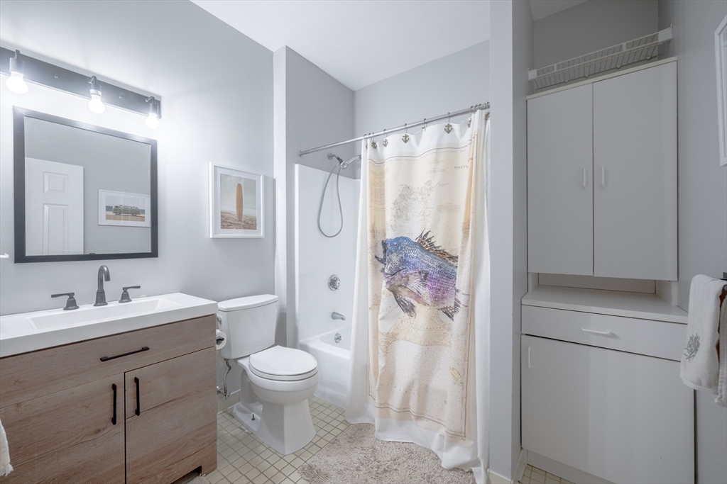 45 Main Street, Unit 38 Wareham, MA 02571 - Photo 8 of 30 a bathroom with a sink toilet and shower
