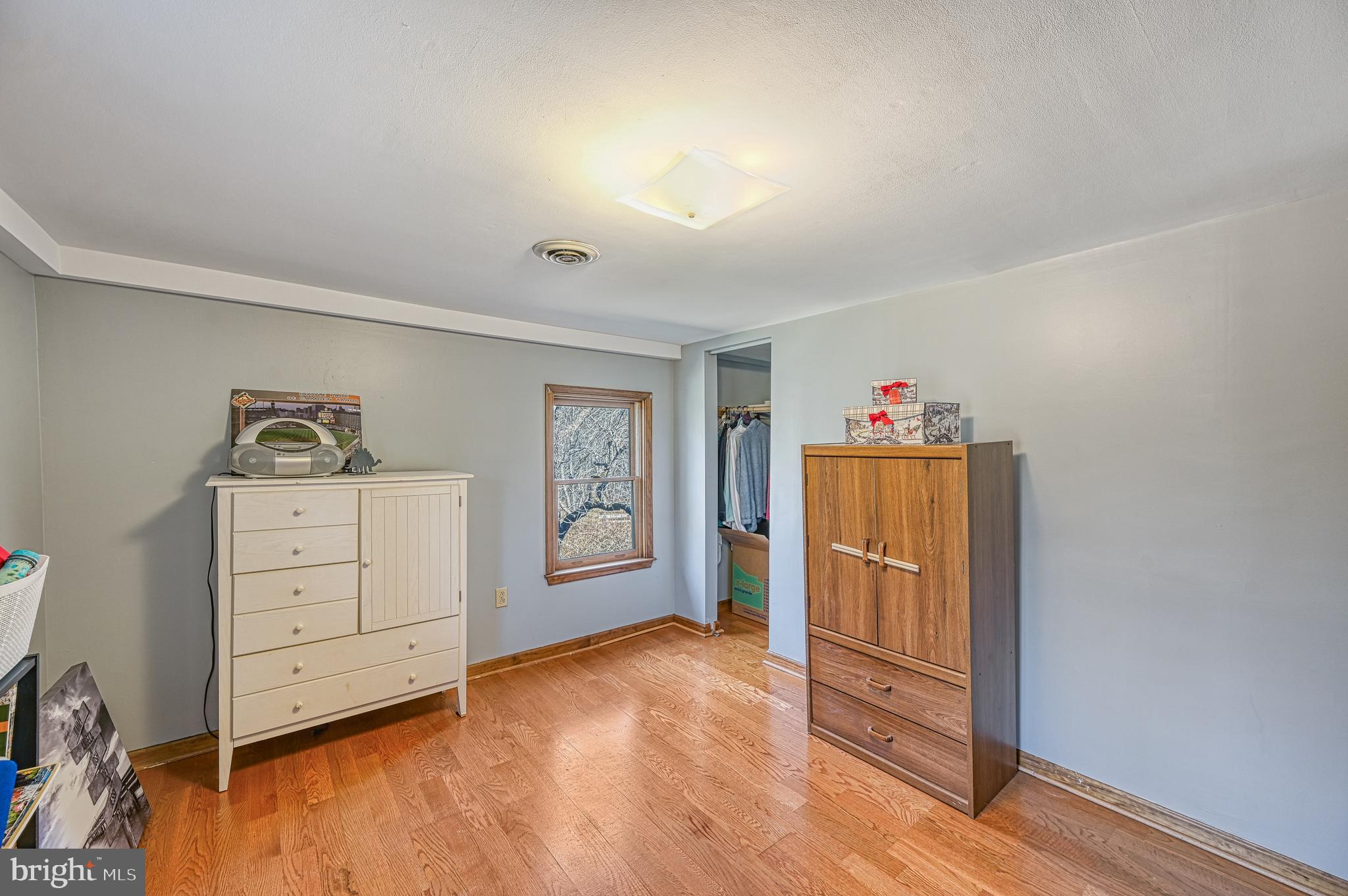 3492 Roundabout Road Louisa, VA 23093 - Photo 33 of 35 wooden floor and windows in a room