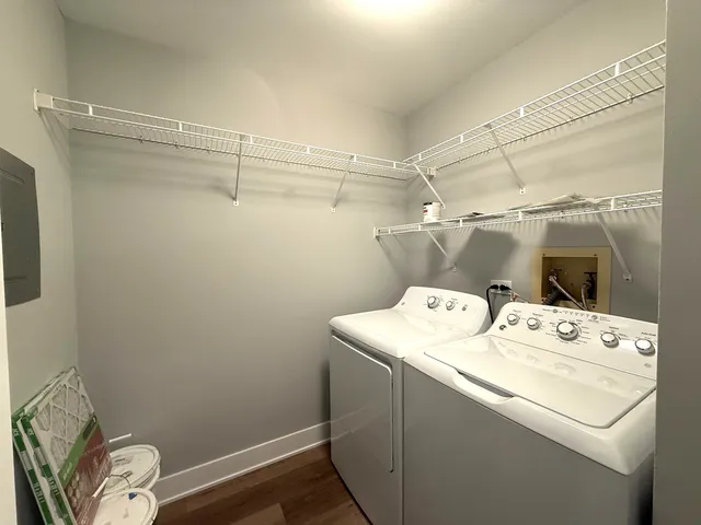 a front view of a building with parking area