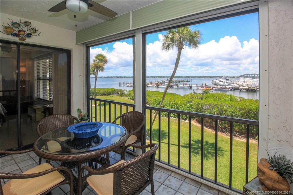 350 Northeast Edgewater Drive, Unit 202 Stuart, FL 34996 - Photo 14 of 28 a view of a city from a dining room