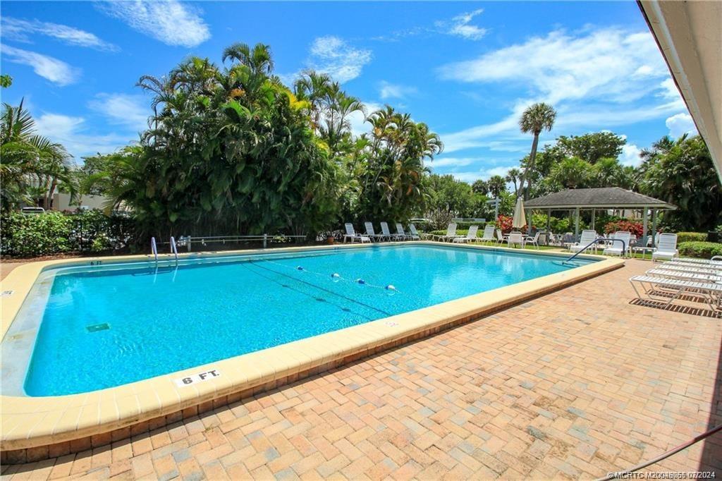 350 Northeast Edgewater Drive, Unit 202 Stuart, FL 34996 - Photo 26 of 28 a view of swimming pool