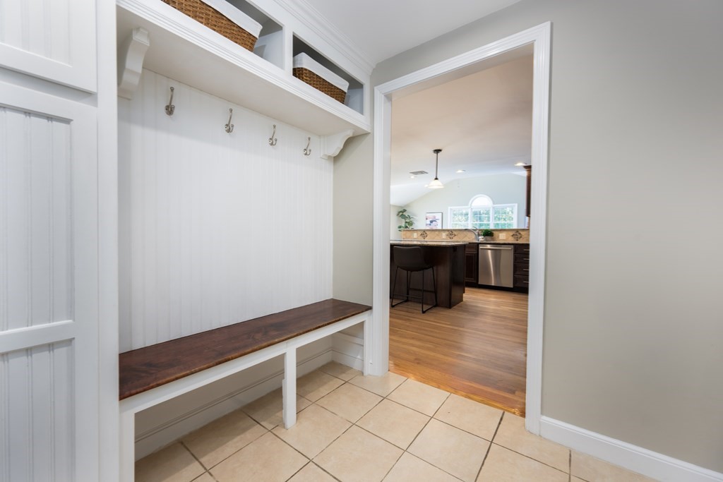 6 Old Meadow Lane Canton, MA 02021 - Photo 26 of 35 a en suite bathroom with a sink and a mirror