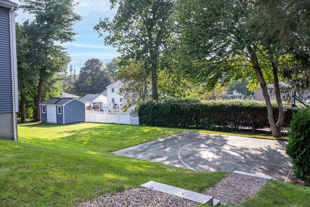 6 Old Meadow Lane Canton, MA 02021 - Photo 27 of 35 a view of a big yard with large trees