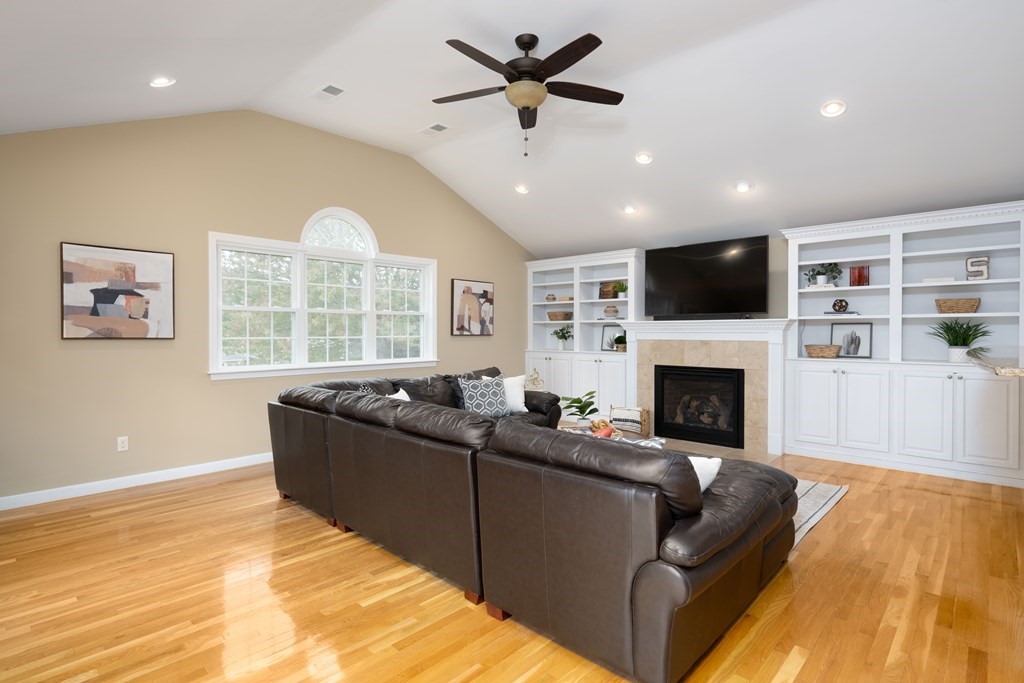6 Old Meadow Lane Canton, MA 02021 - Photo 6 of 35 a living room with furniture fireplace and flat screen tv