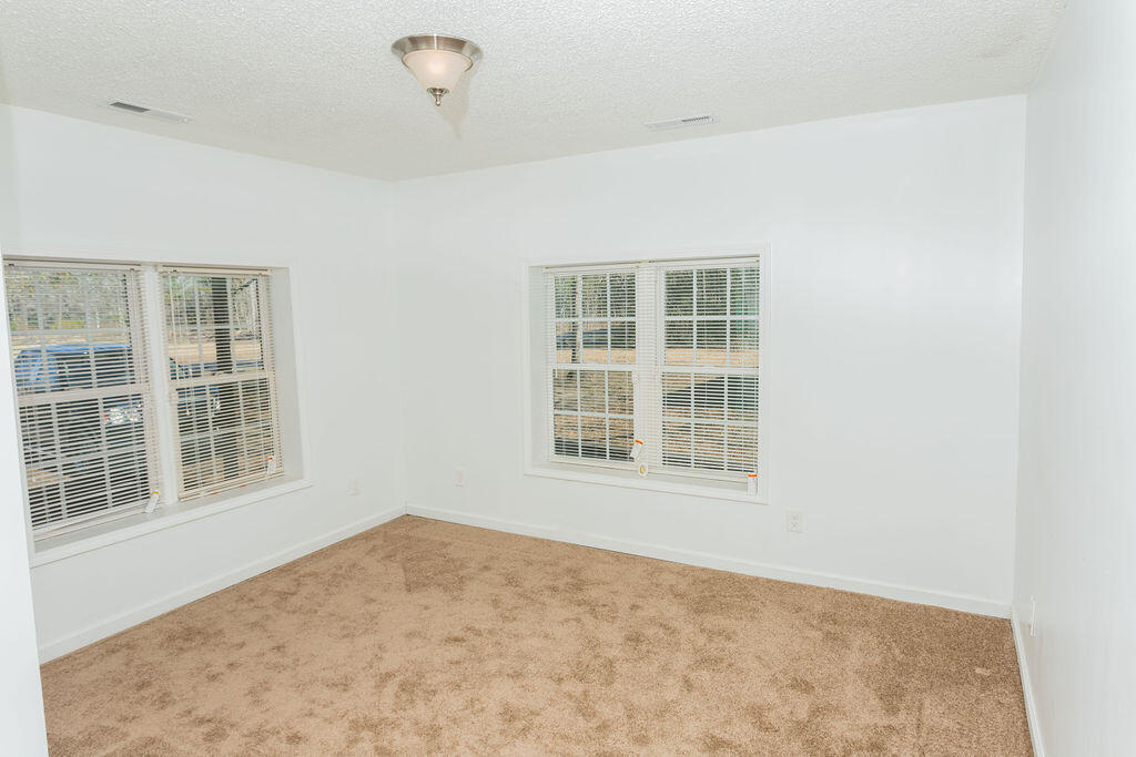 4741 Narrow Paved Road Lynchburg, SC 29080 - Photo 8 of 15 Living room, updated windows to allow plenty of natural light.