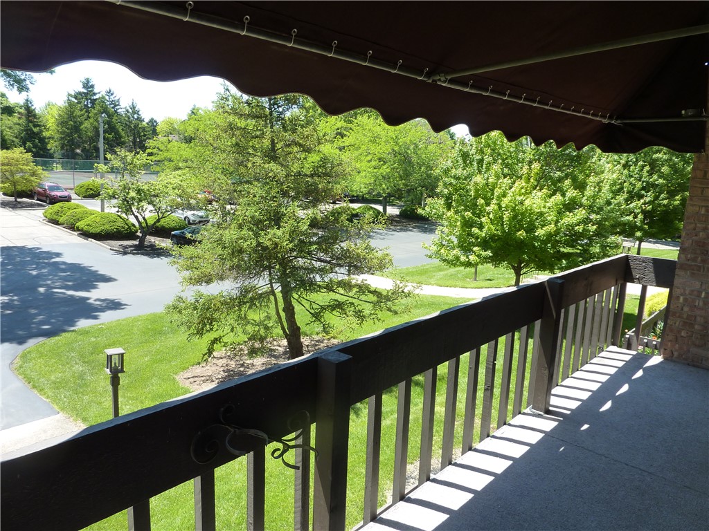1345 Tattersall Road, Unit 64 Dayton, OH 45459 - Photo 23 of 25 This tranquil outdoor space offers a peaceful escape with verdant landscaping and ample privacy.