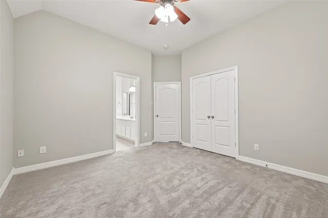 a view of a patio with couches table and chairs with wooden floor
